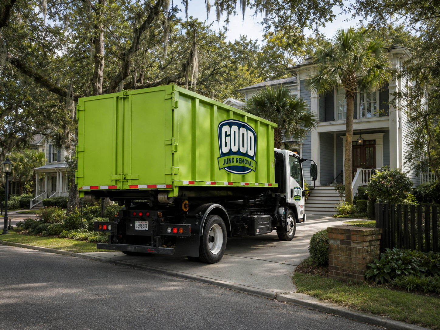 Good Junk crew loading furniture into a junk removal truck in Charleston, SC